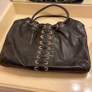 Michael Kors Black leather tote with silver hardware and magnetic closure